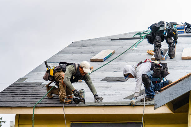 Professional Storm Damage Roof Repair technician working in California, CA